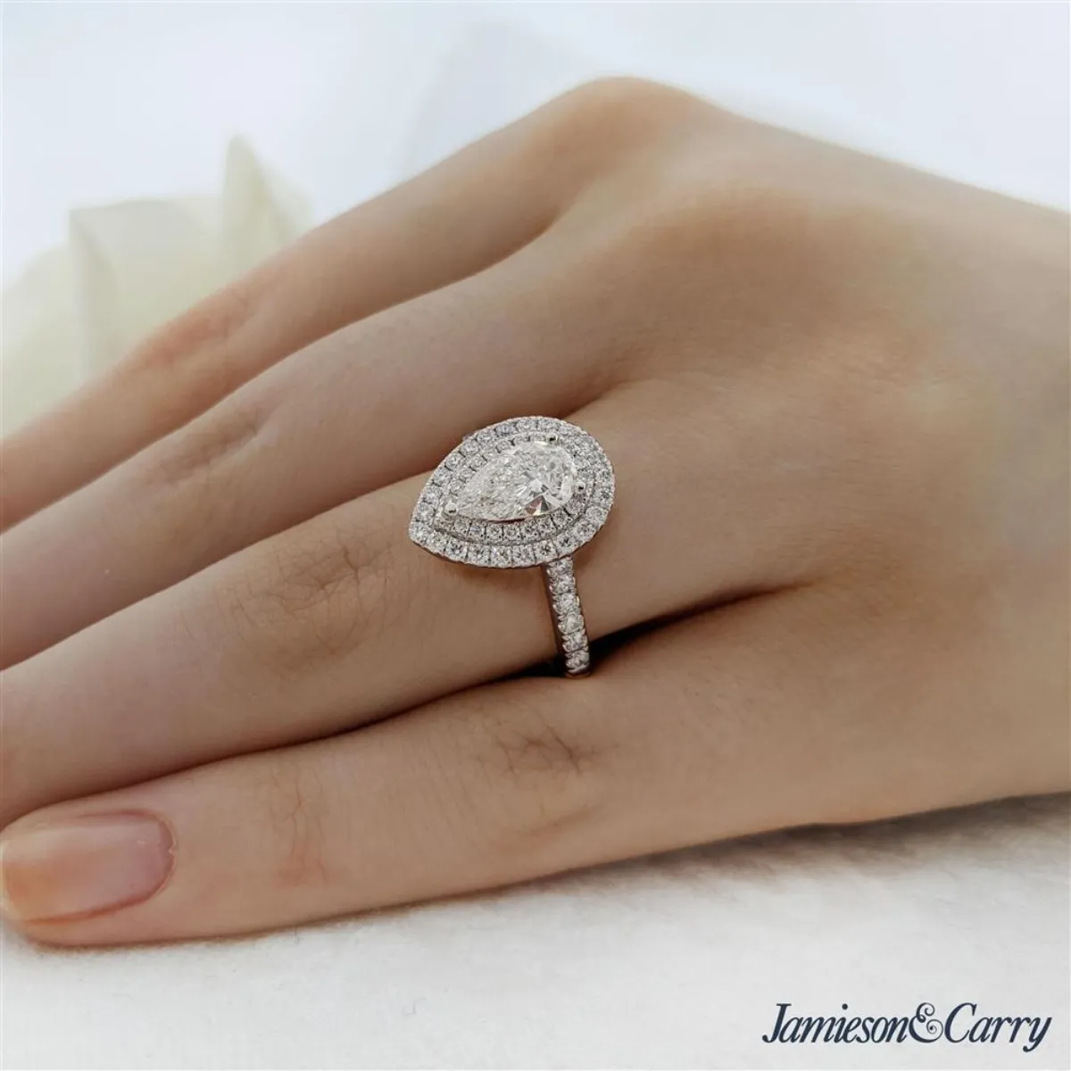 Cluster pear 2025 engagement ring